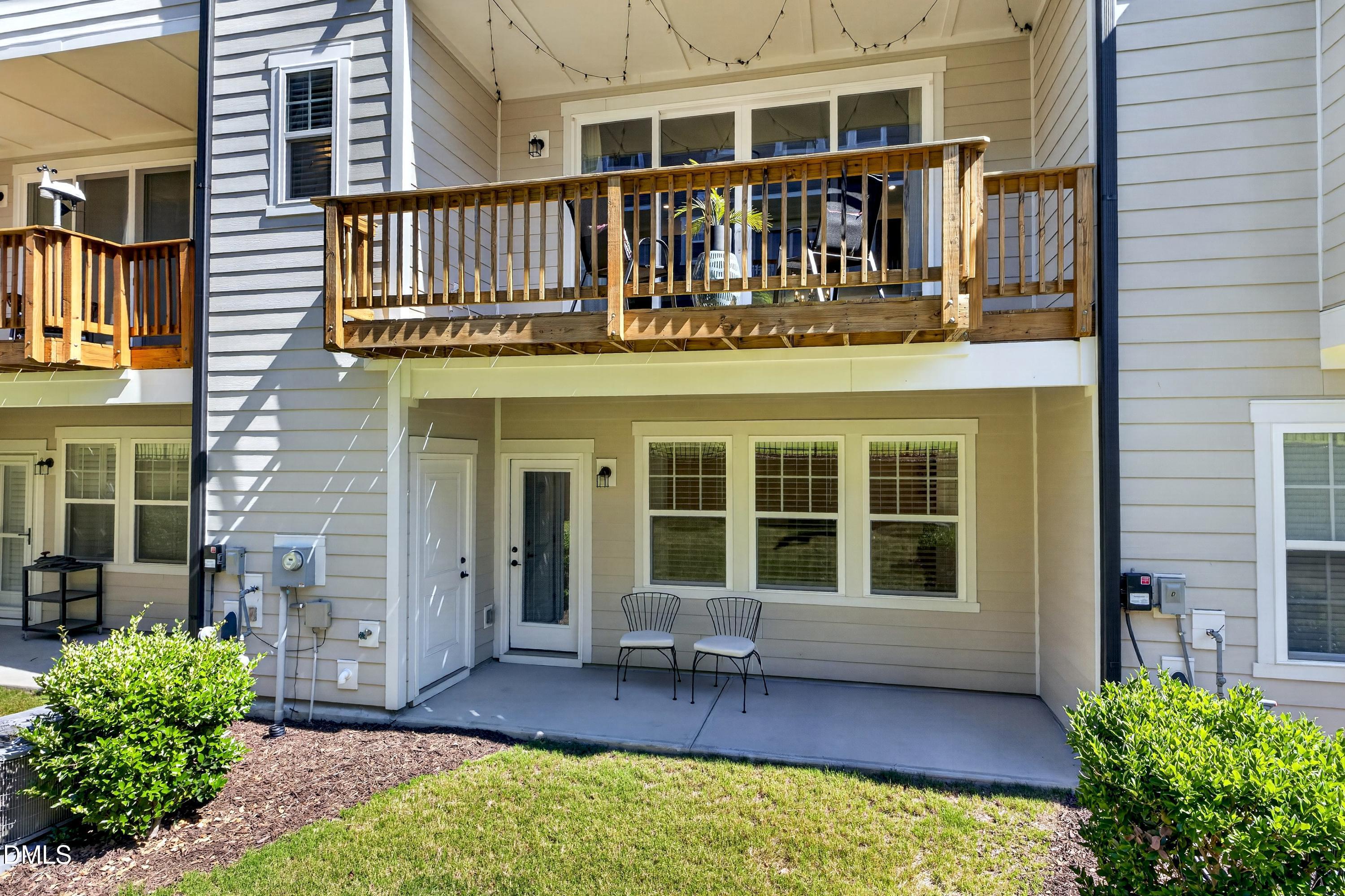 1063 Danvers Loop Apex, NC 27523 - Photo 64 of 67 a view of a house with a lounge chair