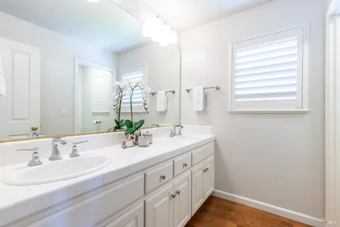 a view of bathroom with washer and dryer