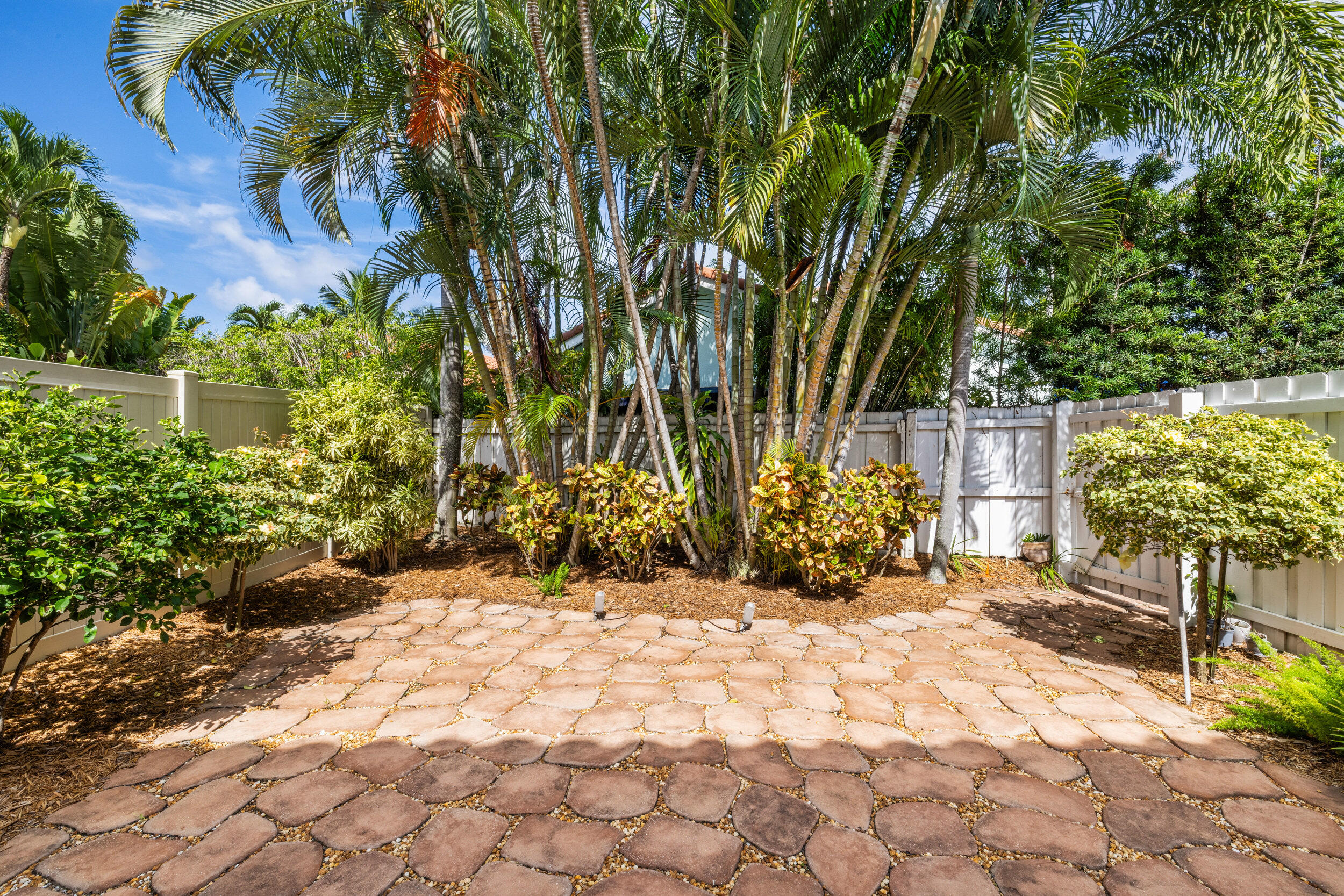 3501 Harbor Circle Delray Beach, FL 33483 - Photo 16 of 25 a view of a pathway with a yard