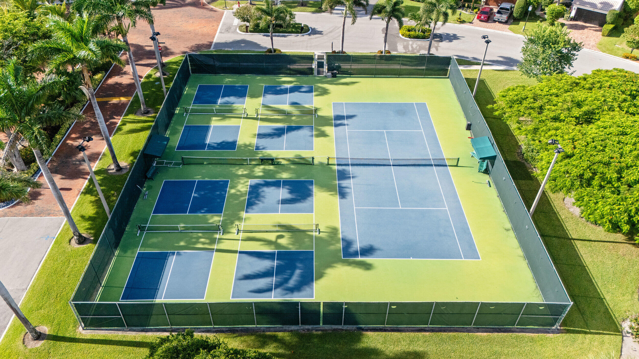 3501 Harbor Circle Delray Beach, FL 33483 - Photo 20 of 25 a view of swimming pool with outdoor seating and yard