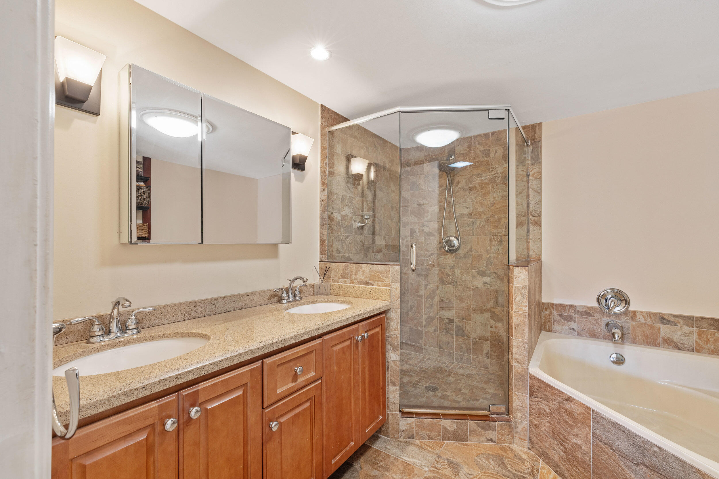 3501 Harbor Circle Delray Beach, FL 33483 - Photo 9 of 25 a bathroom with a sink double vanity granite tub shower and a mirror