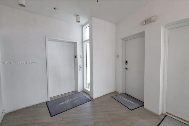 a view of swimming pool from a balcony