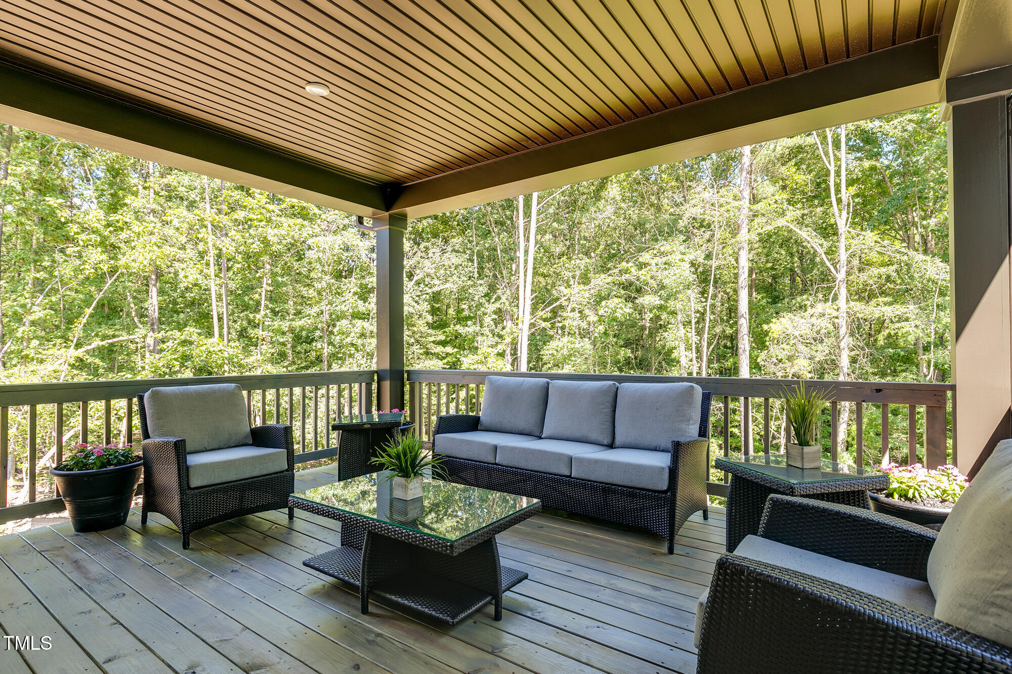 565 Freedom Trail Drive Willow Spring, NC 27592 - Photo 3 of 25 a balcony with furniture and a large window