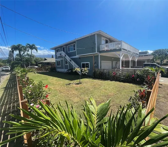 a view of a house with swimming pool