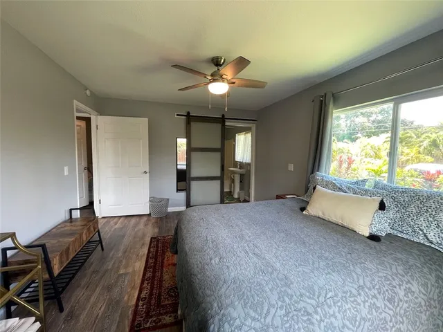 a view of a chairs and table in the patio