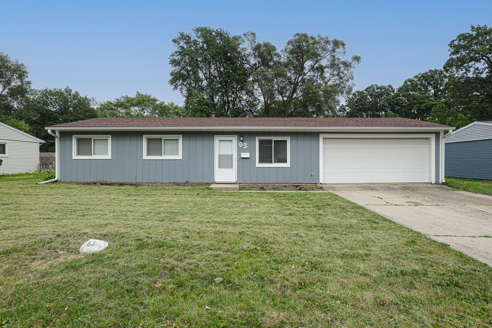 63 Sierra Road Montgomery, IL 60538 - Photo 1 of 22 a house view with a backyard space