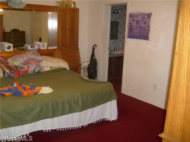 2933 Simerson Road Linwood, NC 27299 - Photo 8 of 13 Master Bedroom.