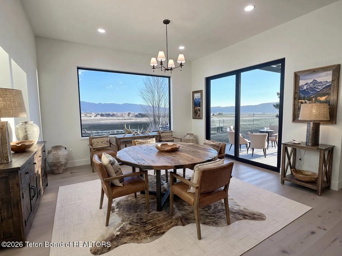 371 Desert Fox Lane Victor, ID 83455 - Photo 6 of 46 virtually staged dining room