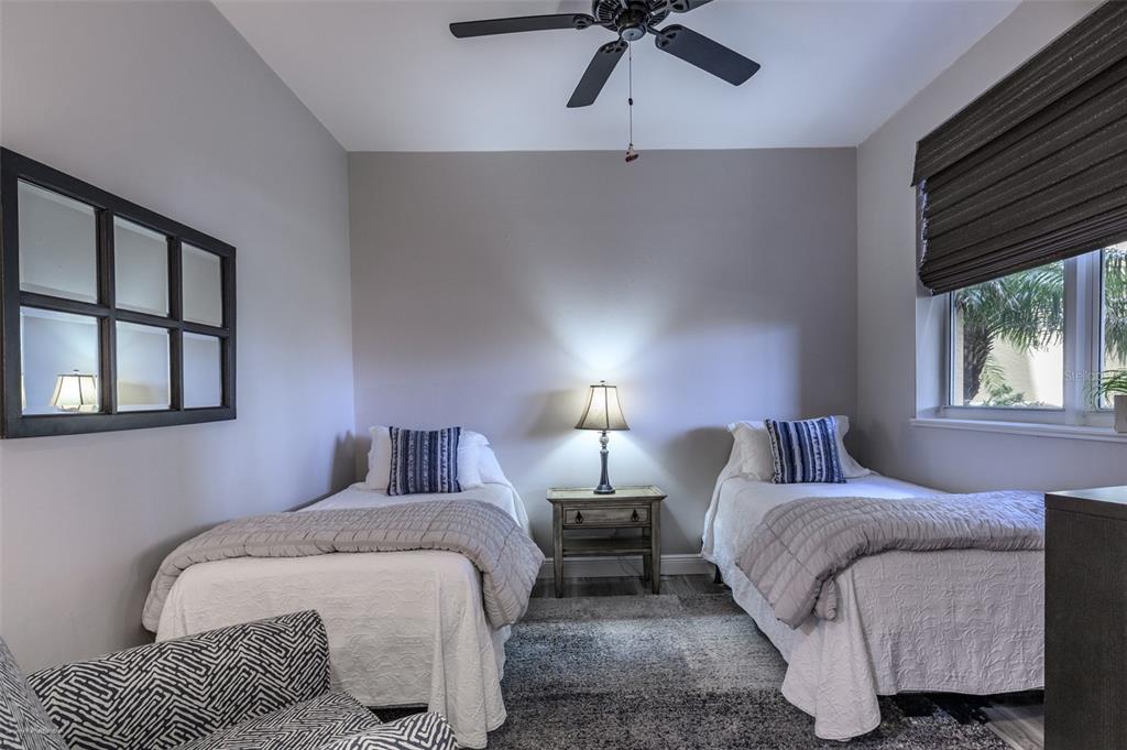 3313 Sunset Key Circle, Unit 107 Punta Gorda, FL 33955 - Photo 44 of 58 a bedroom with a bed and window