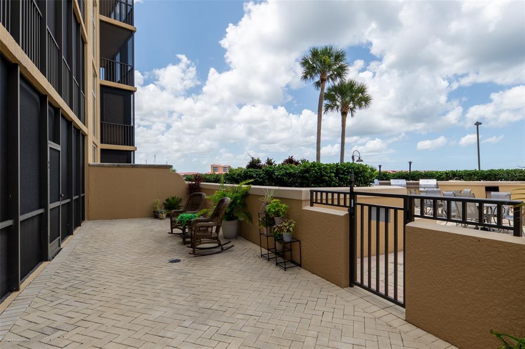 3313 Sunset Key Circle, Unit 107 Punta Gorda, FL 33955 - Photo 51 of 58 a view of roof deck with chair and iron fence
