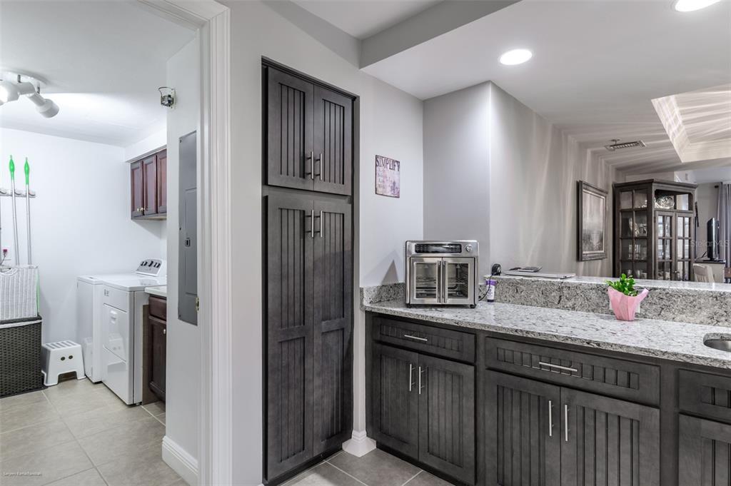 3313 Sunset Key Circle, Unit 107 Punta Gorda, FL 33955 - Photo 10 of 58 a bathroom with a sink double vanity and a mirror