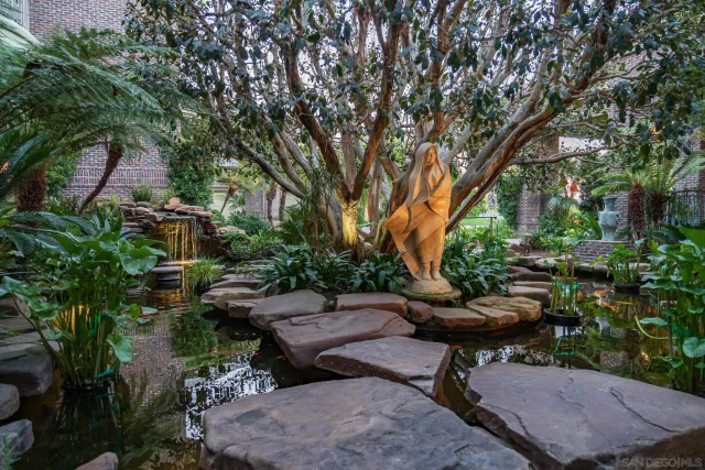 a view of a backyard of the house