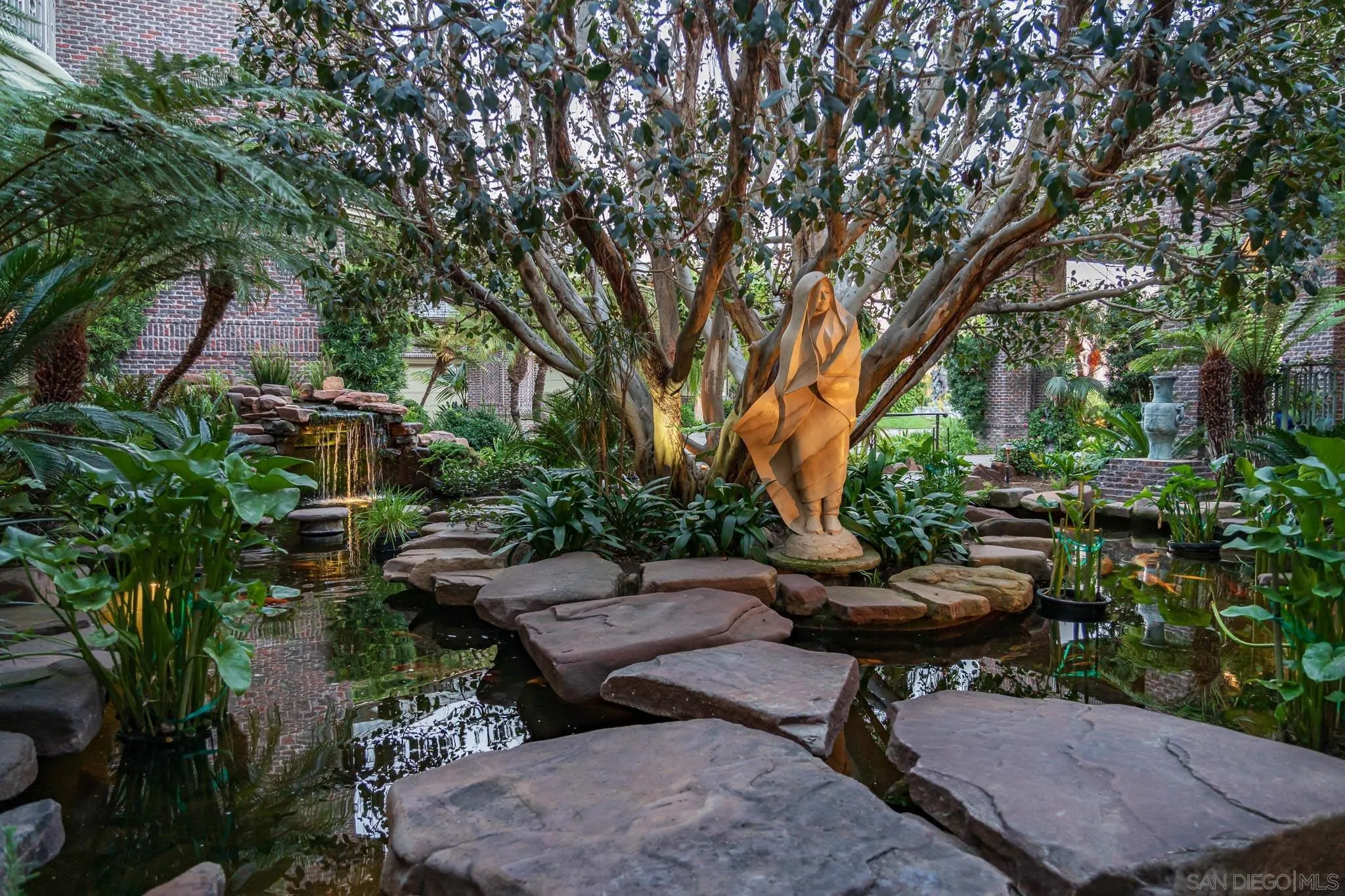 5893 Winland Hills Drive Rancho Santa Fe, CA 92067 - Photo 12 of 41 a view of a backyard with sitting area