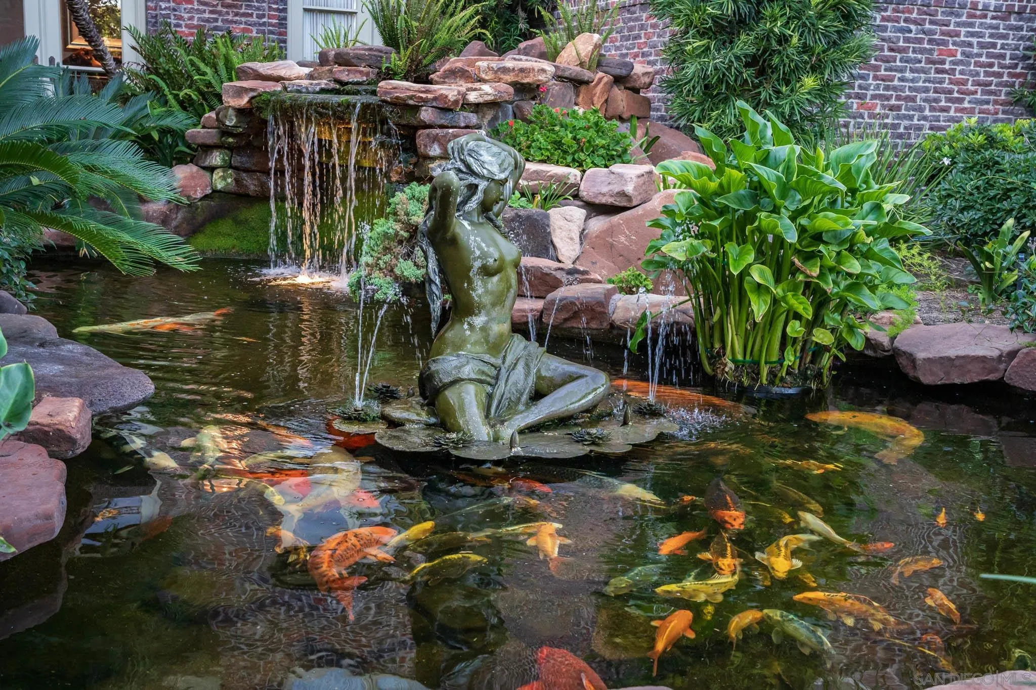 5893 Winland Hills Drive Rancho Santa Fe, CA 92067 - Photo 13 of 41 a view of a backyard of the house