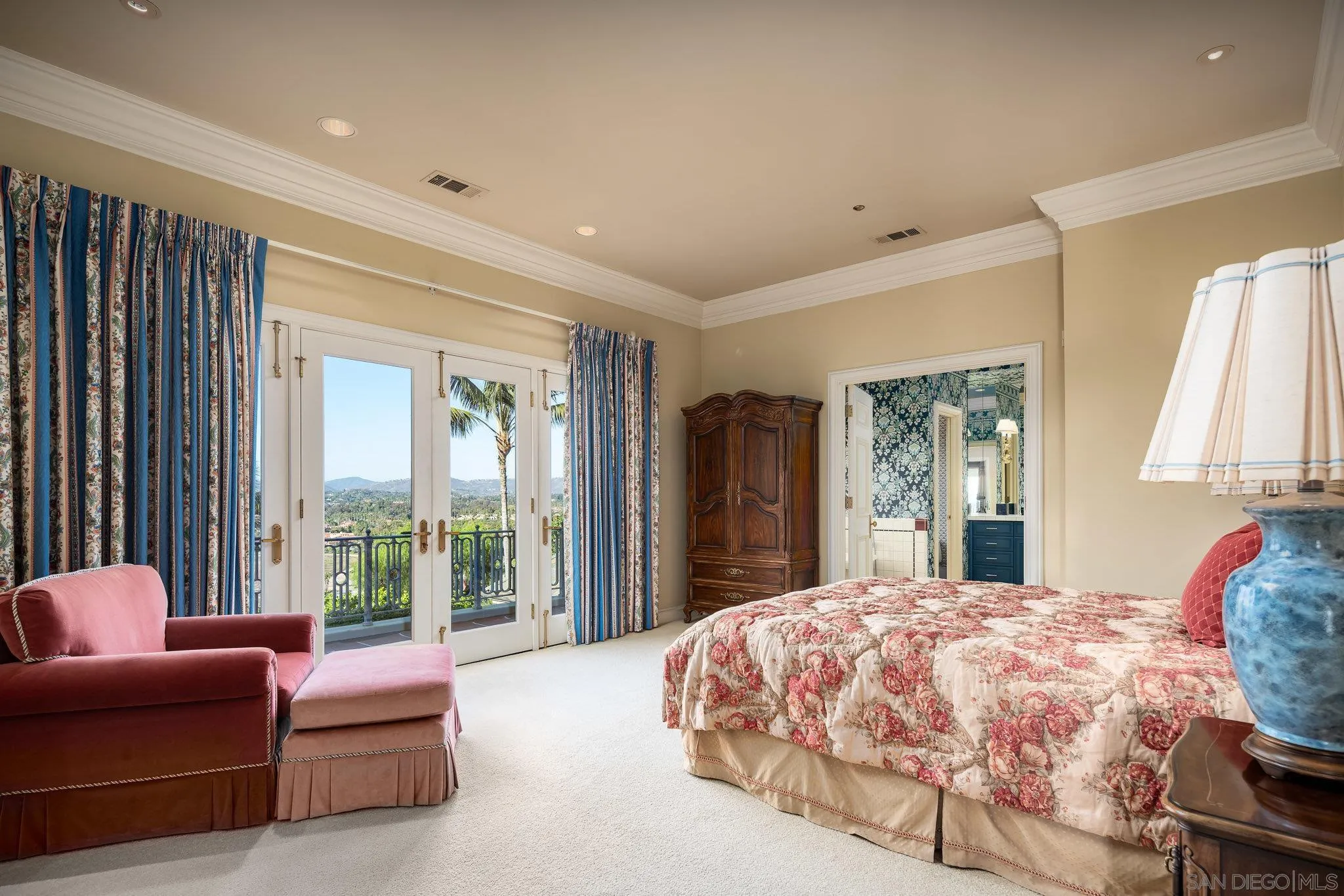 5893 Winland Hills Drive Rancho Santa Fe, CA 92067 - Photo 24 of 41 a bedroom with furniture and large windows