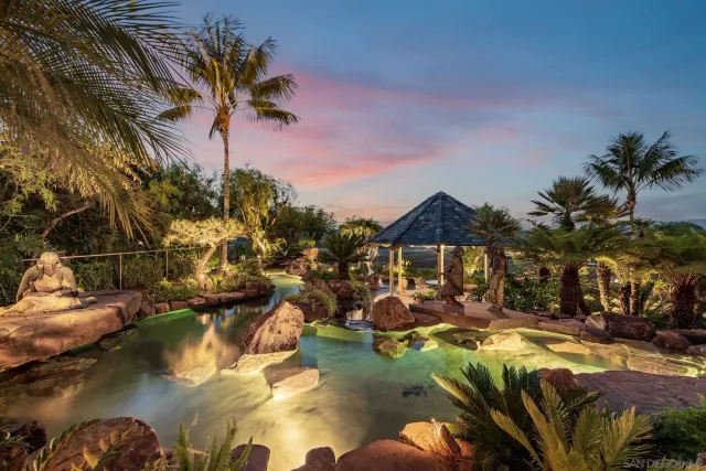 a view of a yard with a fountain