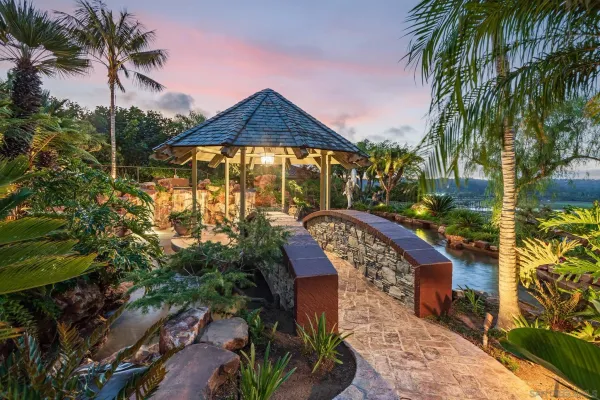 a view of a chairs and table in a patio