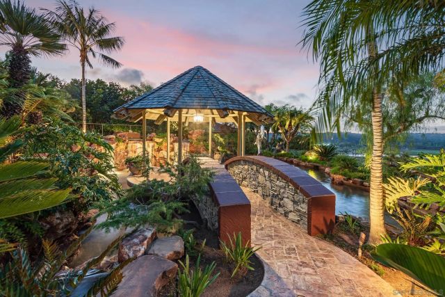 a view of a chairs and table in a patio