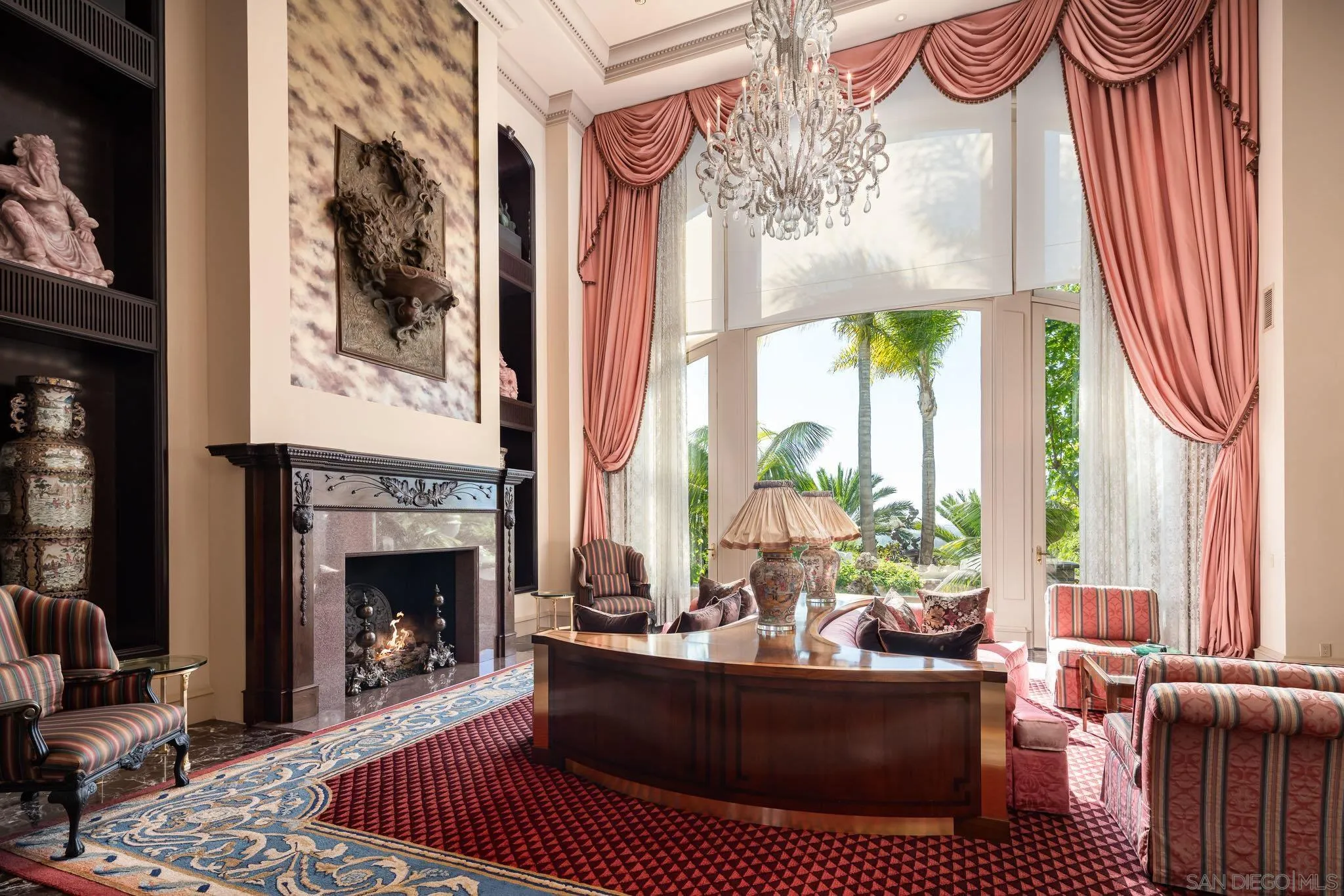 5893 Winland Hills Drive Rancho Santa Fe, CA 92067 - Photo 6 of 41 a living room with furniture a large window and a fireplace