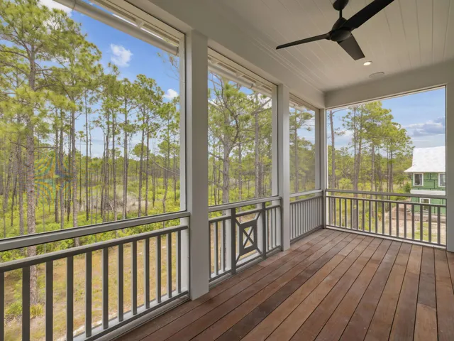 a view of a balcony with furniture