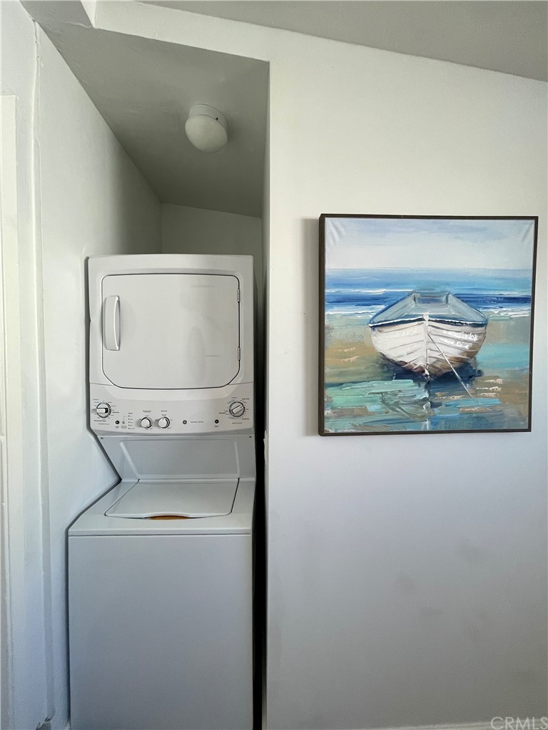 416 Aster Street Laguna Beach, CA 92651 - Photo 11 of 14 a utility room with dryer and washer