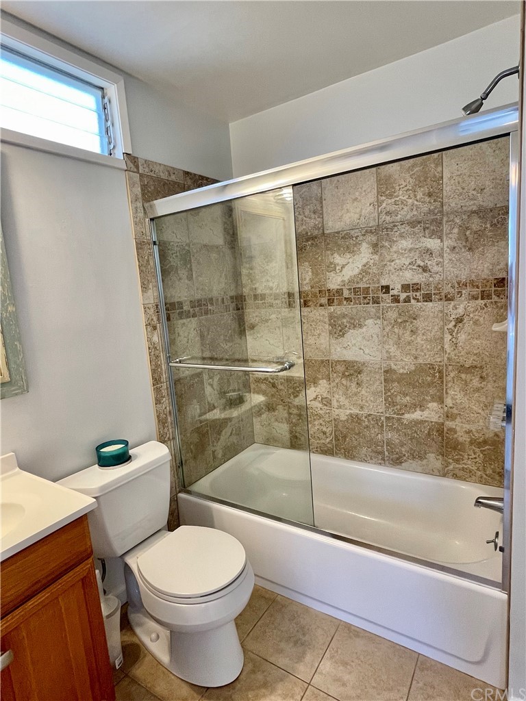 416 Aster Street Laguna Beach, CA 92651 - Photo 12 of 14 a bathroom with a shower and a toilet