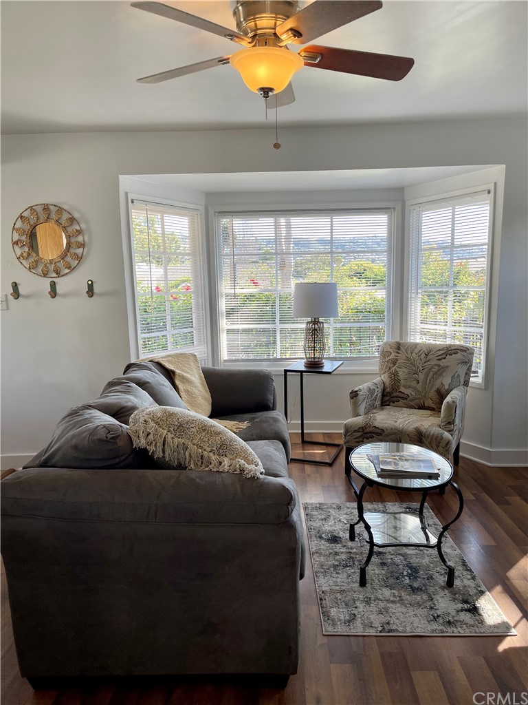 416 Aster Street Laguna Beach, CA 92651 - Photo 3 of 14 a living room with furniture and a large window