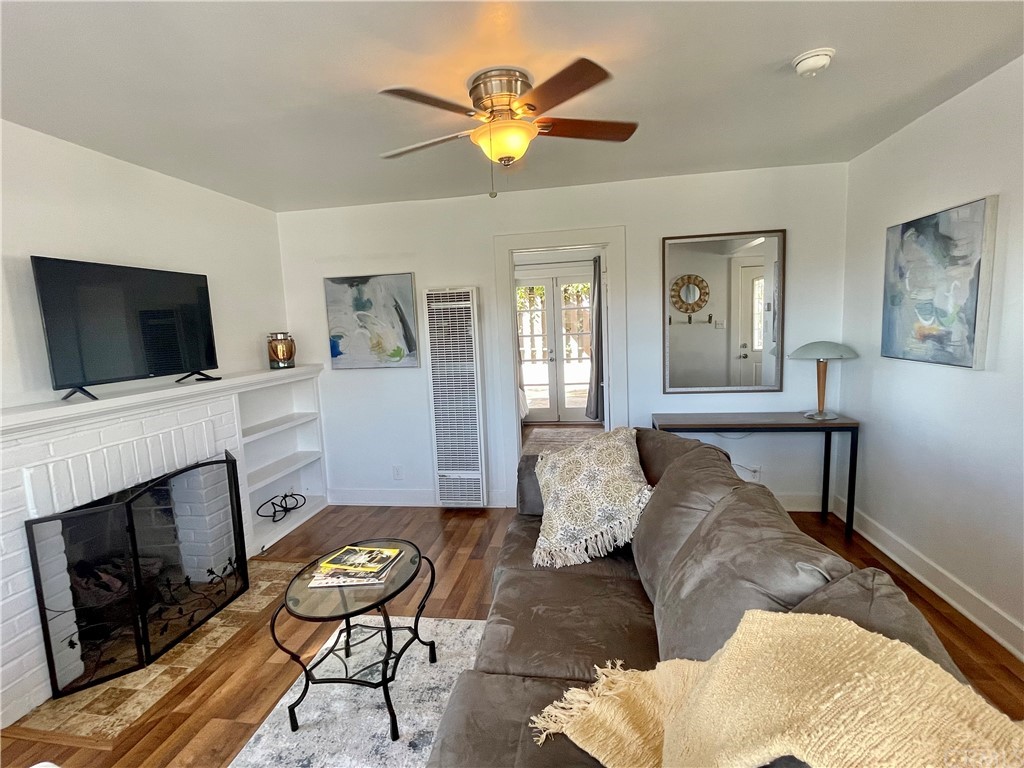 416 Aster Street Laguna Beach, CA 92651 - Photo 6 of 14 a living room with furniture and a flat screen tv