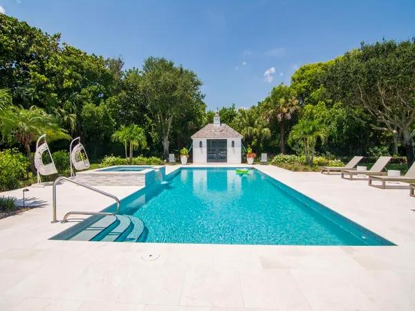 a view of a backyard with a garden