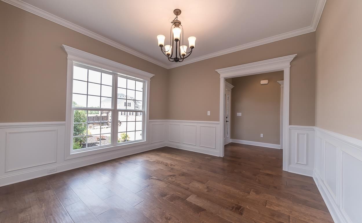 1225 White Rock Road Murfreesboro, TN 37129 - Photo 5 of 29 wooden floor in an empty room with a window