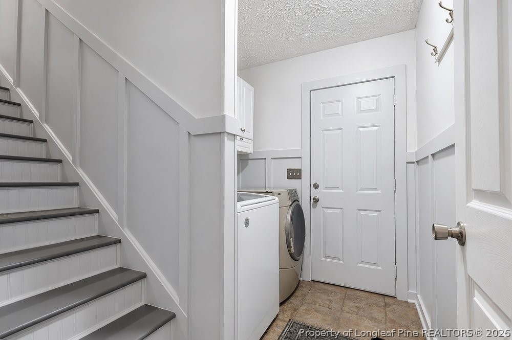 408 Senter Lane Spring Lake, NC 28390 - Photo 16 of 30 a view of a hallway with washer and dryer