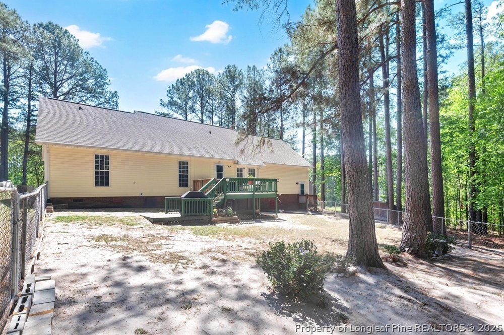408 Senter Lane Spring Lake, NC 28390 - Photo 20 of 30 a view of a house with a yard covered in snow