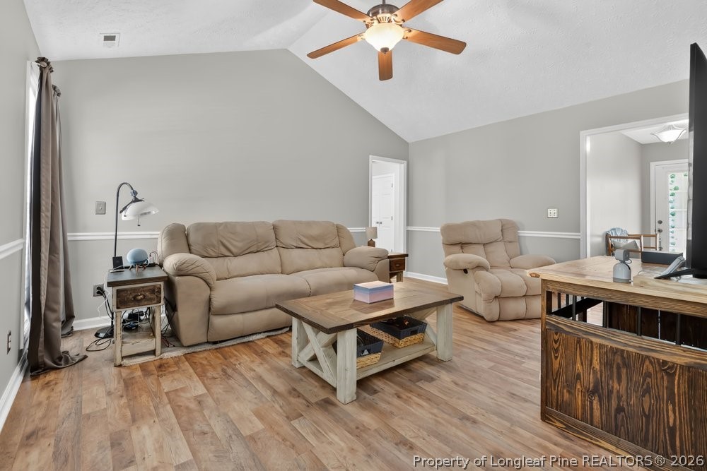 408 Senter Lane Spring Lake, NC 28390 - Photo 2 of 30 a living room with furniture and a wooden floor