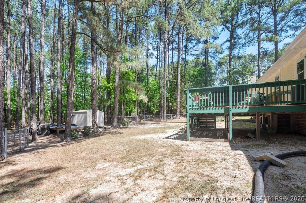 408 Senter Lane Spring Lake, NC 28390 - Photo 23 of 30 a view of a bench in the roof deck