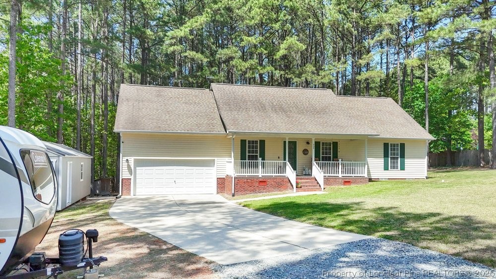 408 Senter Lane Spring Lake, NC 28390 - Photo 24 of 30 a view of a house with a backyard