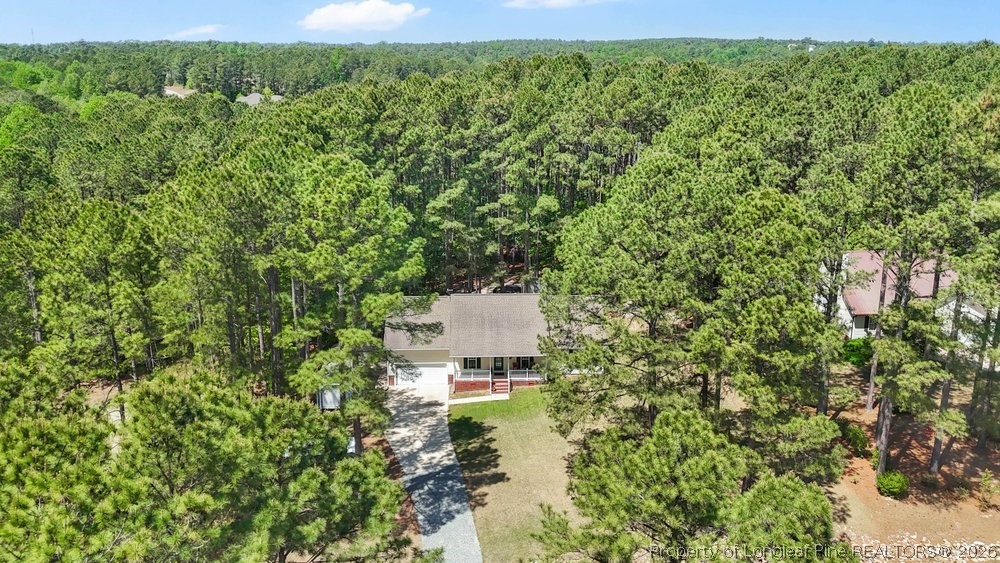 408 Senter Lane Spring Lake, NC 28390 - Photo 26 of 30 a picture of a green field with lots of bushes