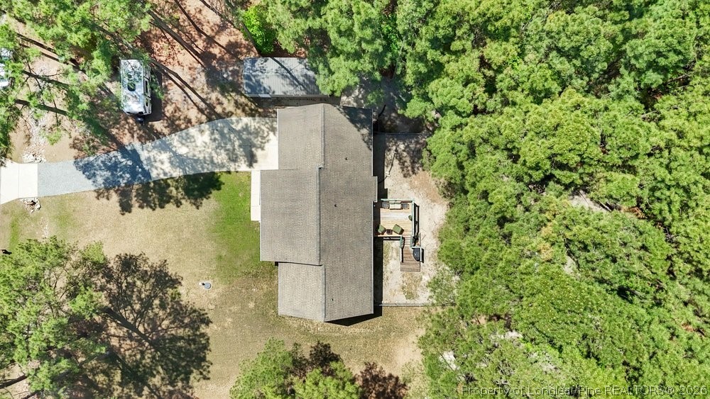 408 Senter Lane Spring Lake, NC 28390 - Photo 27 of 30 a backyard of a house with lots of green space