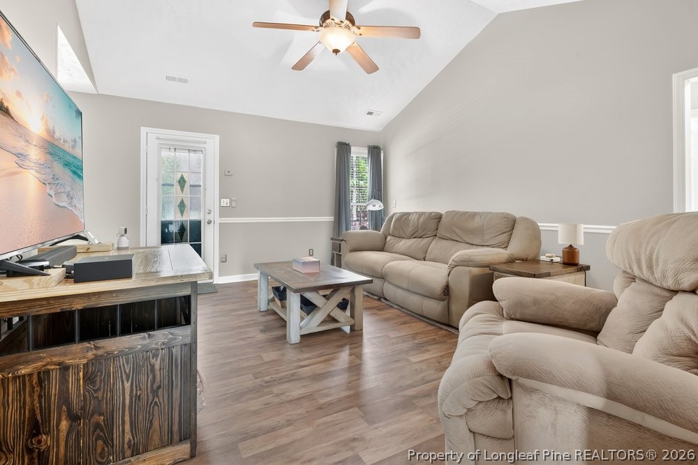 408 Senter Lane Spring Lake, NC 28390 - Photo 3 of 30 a living room with furniture and a chandelier