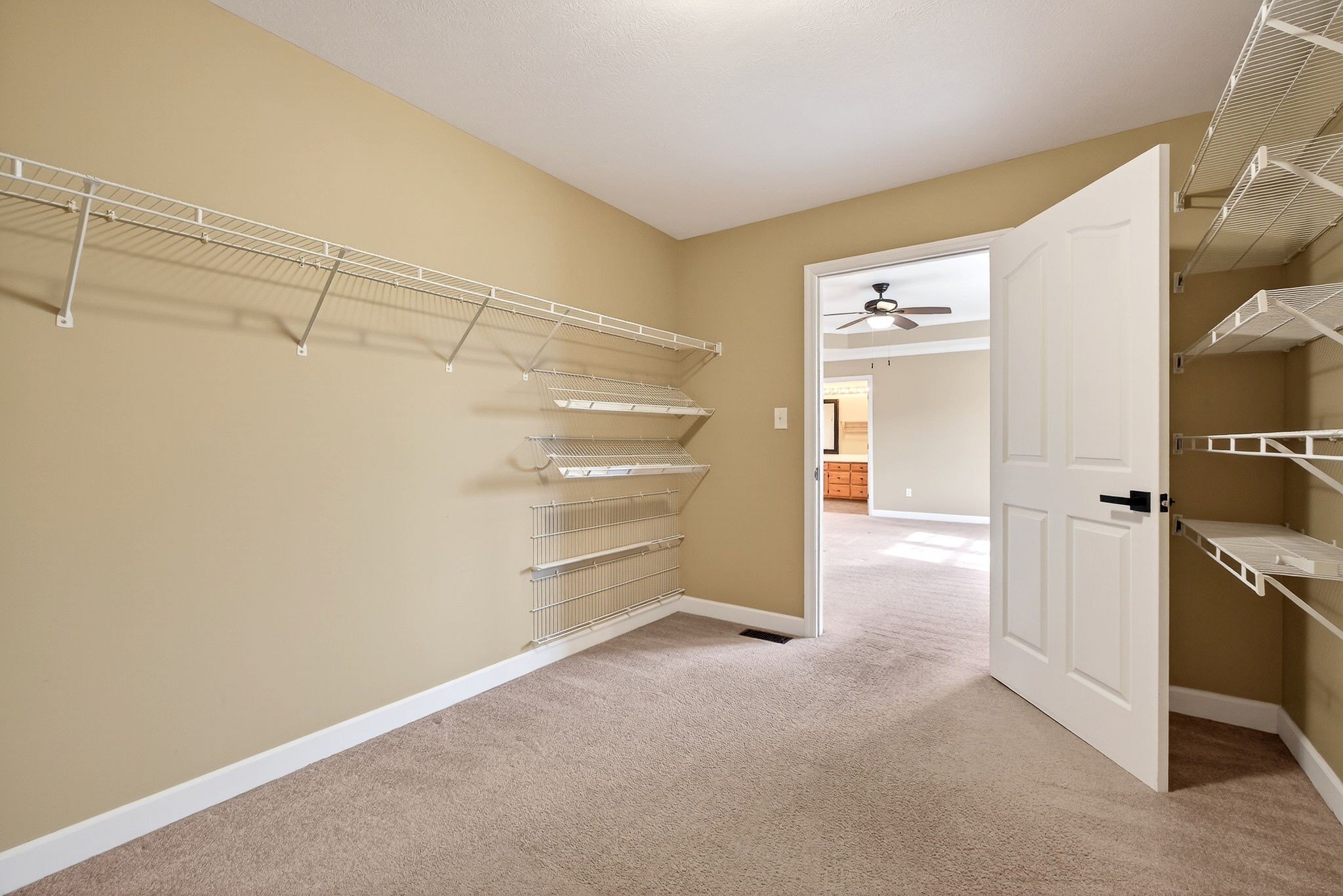 2408 Shellsford Road McMinnville, TN 37110 - Photo 26 of 60 a view of walk in closet with empty racks