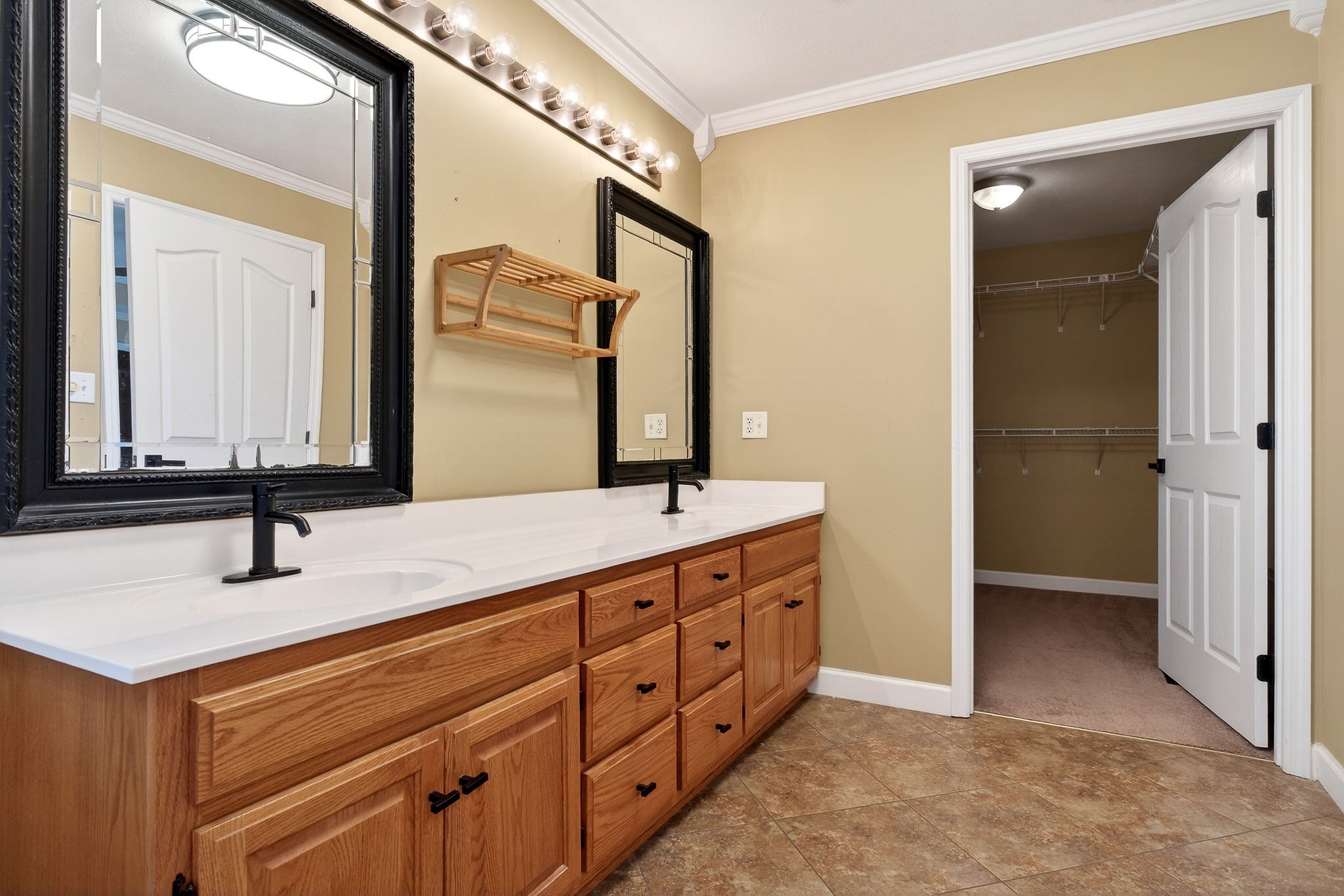 2408 Shellsford Road McMinnville, TN 37110 - Photo 28 of 60 a bathroom with a double vanity sink and a mirror