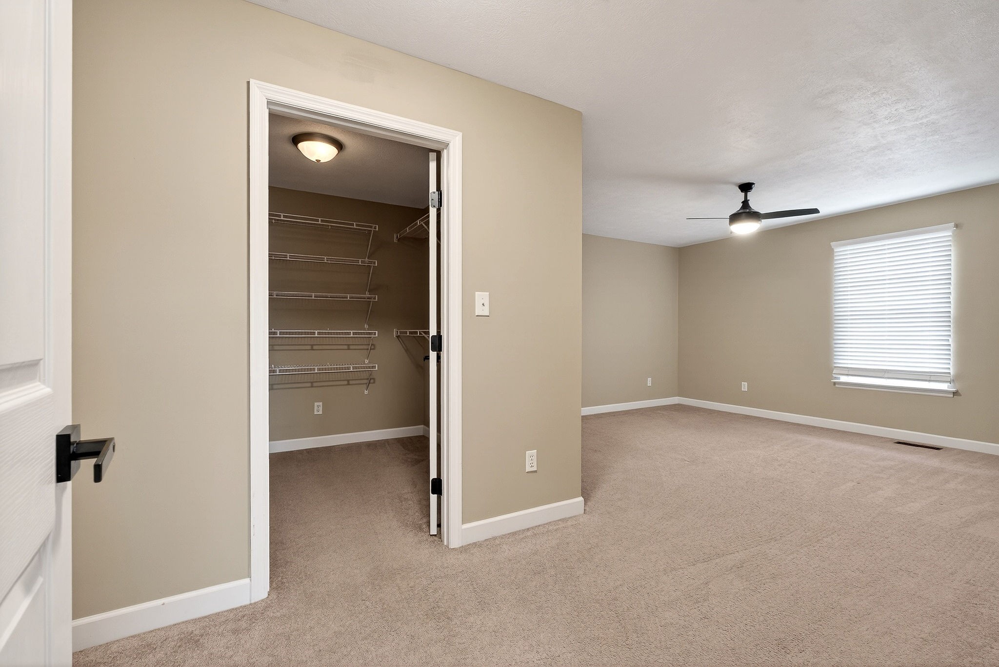 2408 Shellsford Road McMinnville, TN 37110 - Photo 34 of 60 an empty room with windows and cabinet