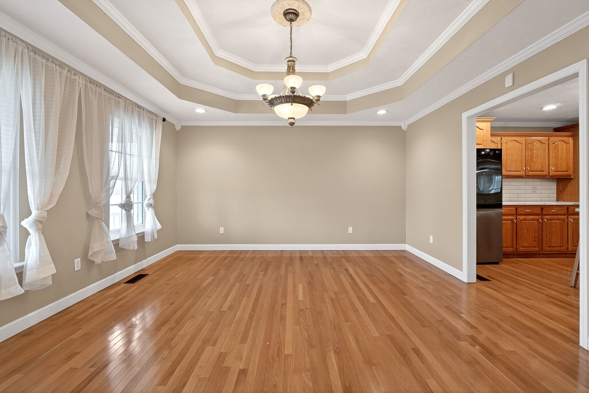 2408 Shellsford Road McMinnville, TN 37110 - Photo 9 of 60 wooden floor in an empty room with a window