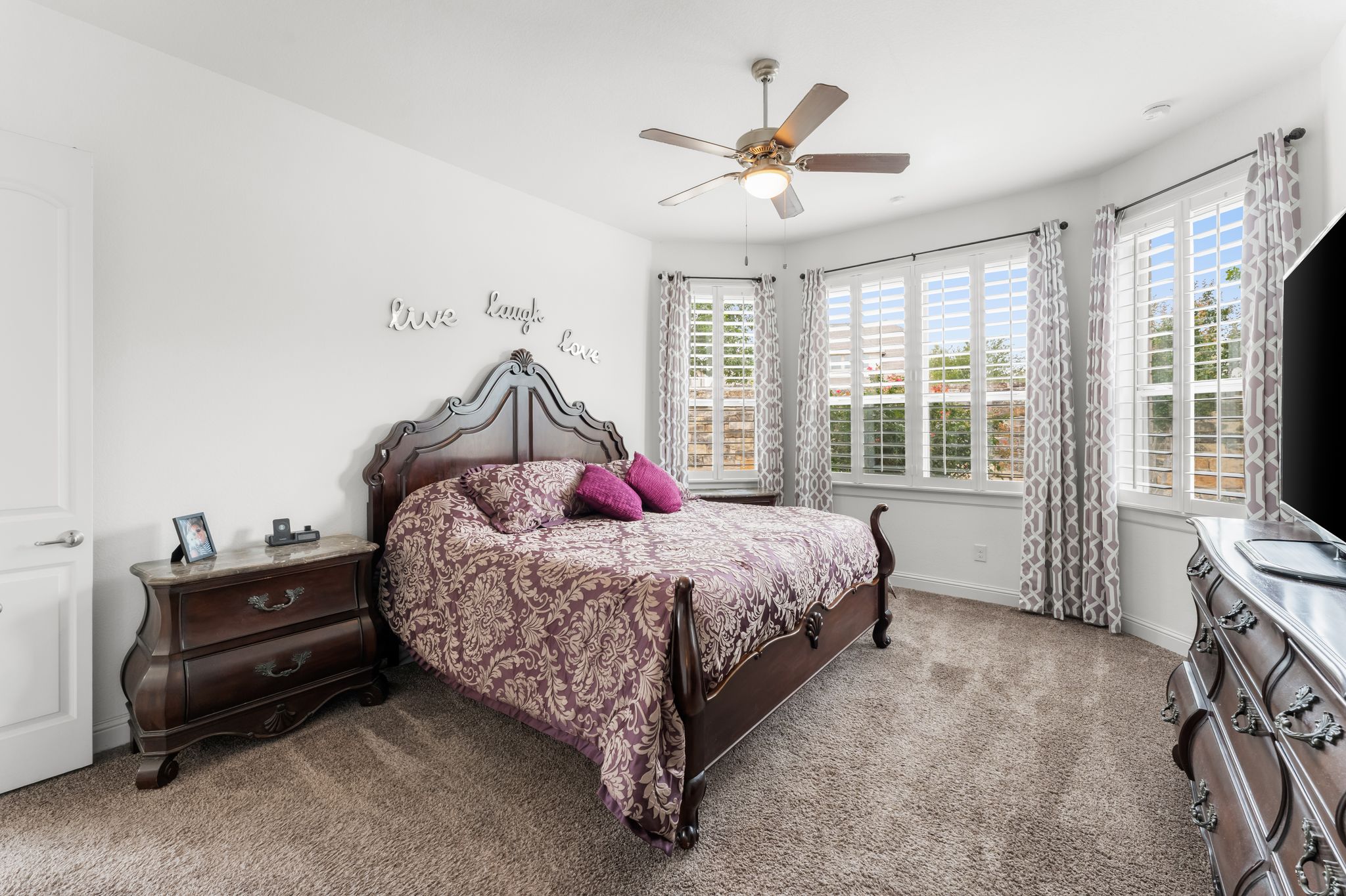 140 Waterloo Cove Georgetown, TX 78628 - Photo 20 of 40 Primary Bedroom with plantation shutters and bay windows!