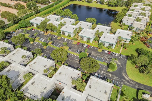 an aerial view of a house with a garden