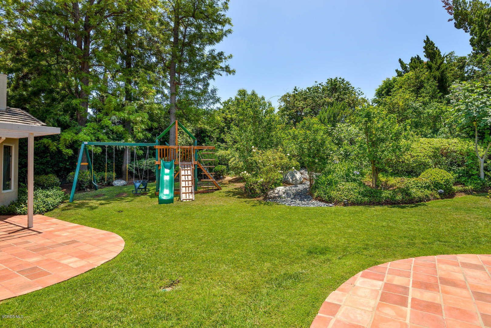 18932 Olympia Street Porter Ranch, CA 91326 - Photo 21 of 39 a view of a park with large trees