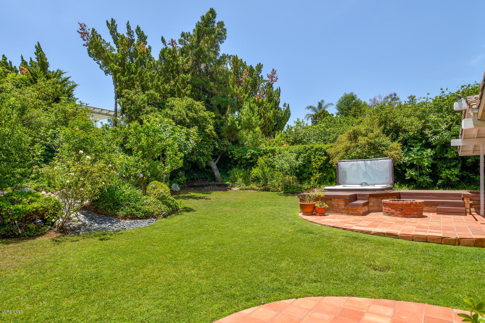 18932 Olympia Street Porter Ranch, CA 91326 - Photo 22 of 39 a view of a house with a yard