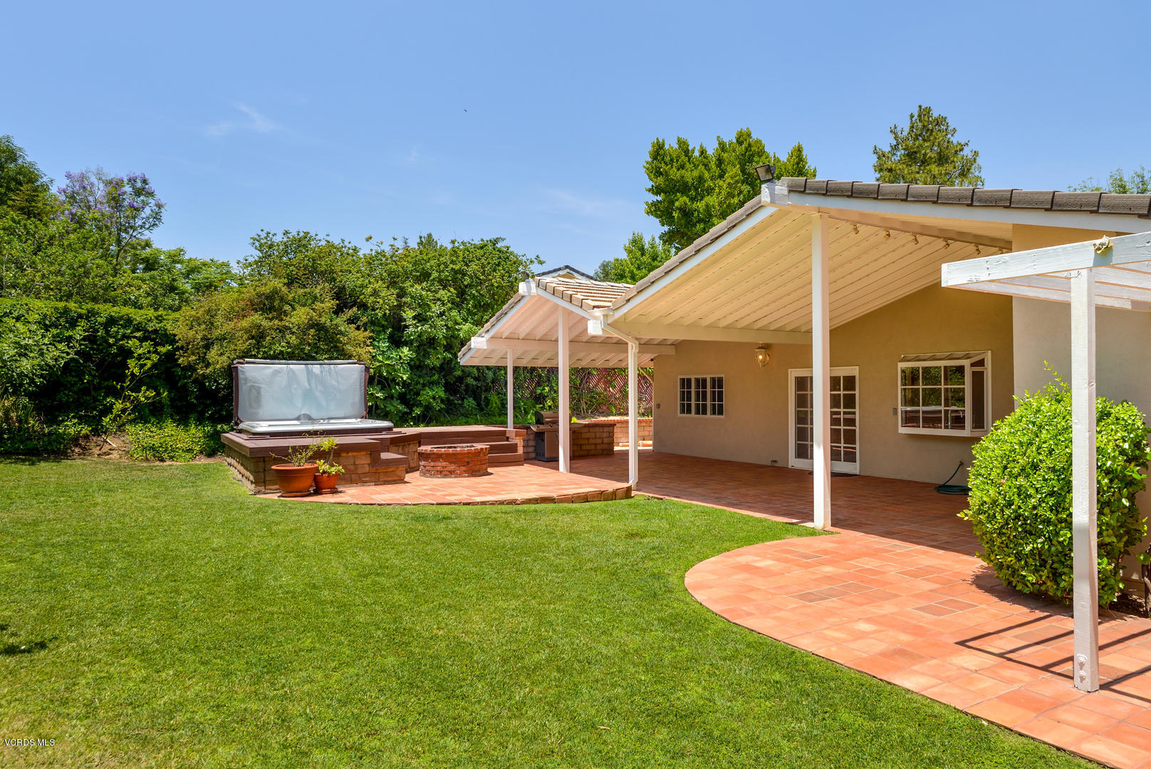 18932 Olympia Street Porter Ranch, CA 91326 - Photo 23 of 39 a view of a house with a yard porch and sitting area