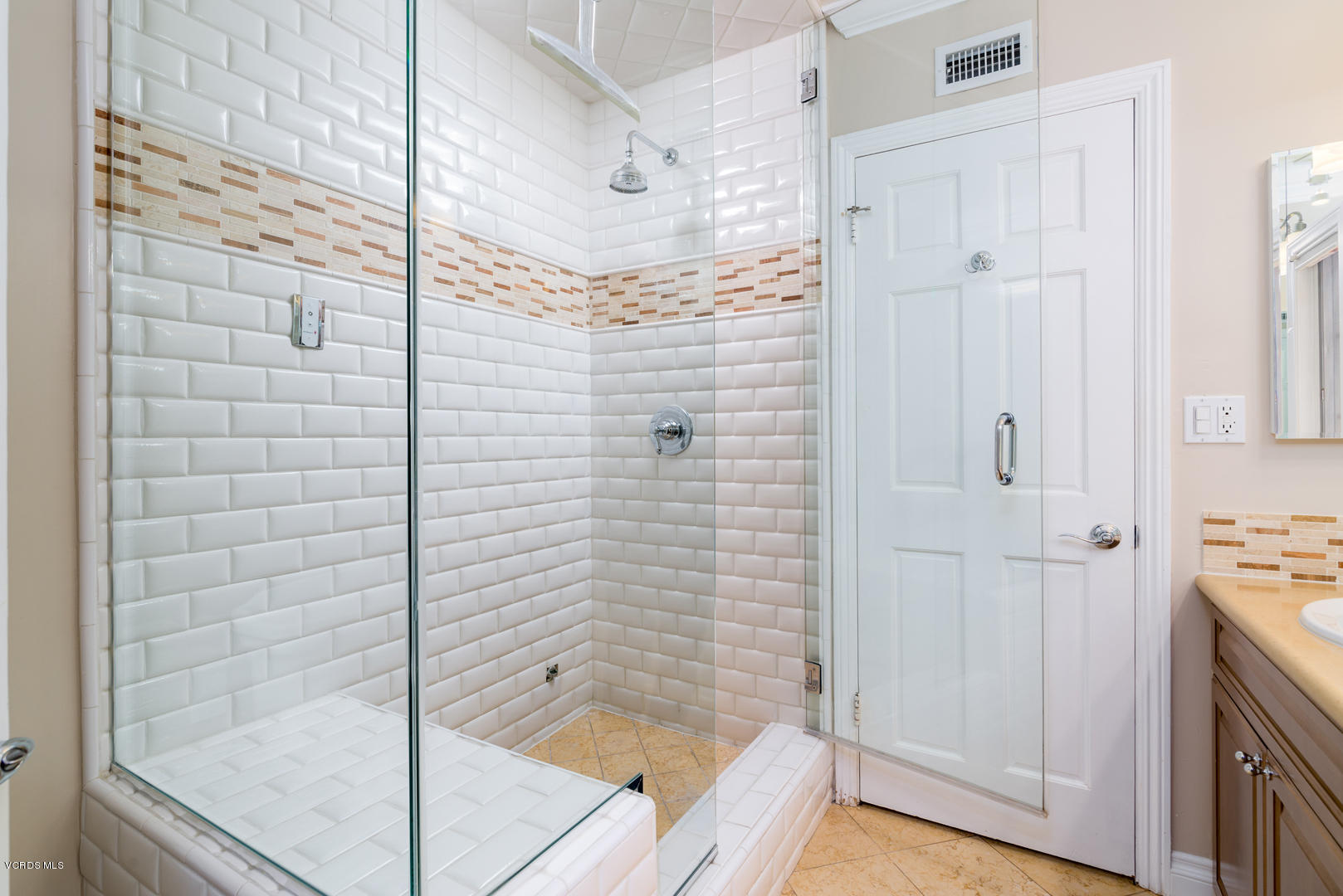 18932 Olympia Street Porter Ranch, CA 91326 - Photo 30 of 39 a bathroom with a shower and a sink