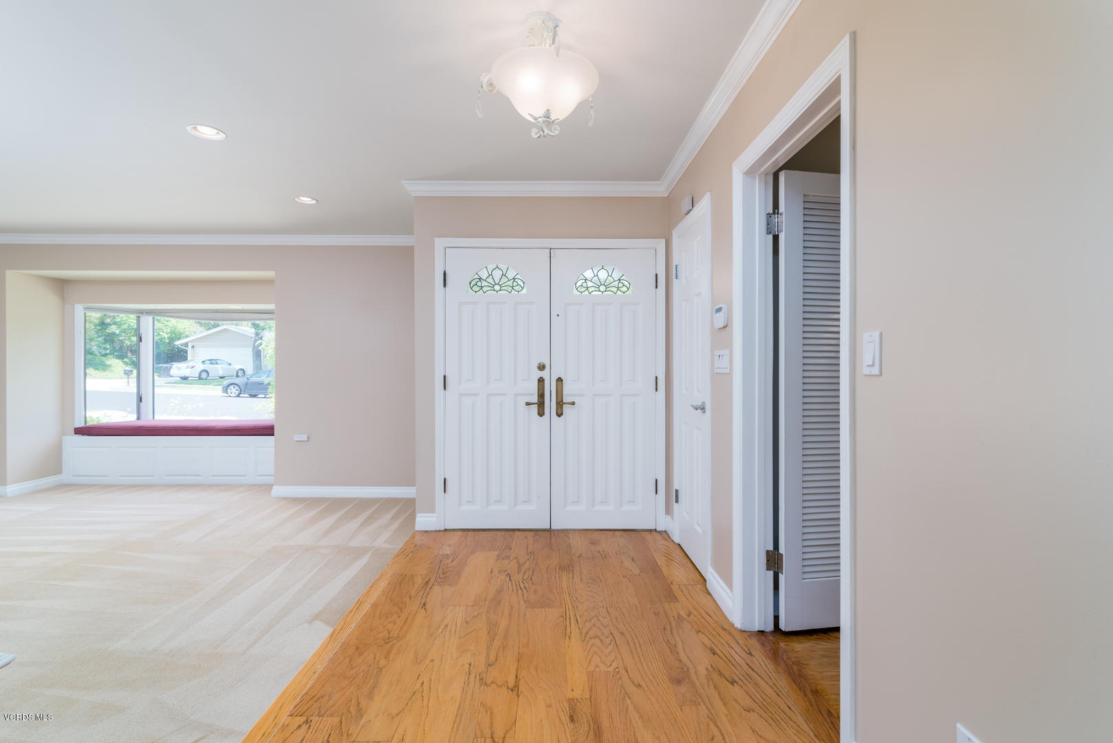 18932 Olympia Street Porter Ranch, CA 91326 - Photo 4 of 39 a view of a room with wooden floor and window