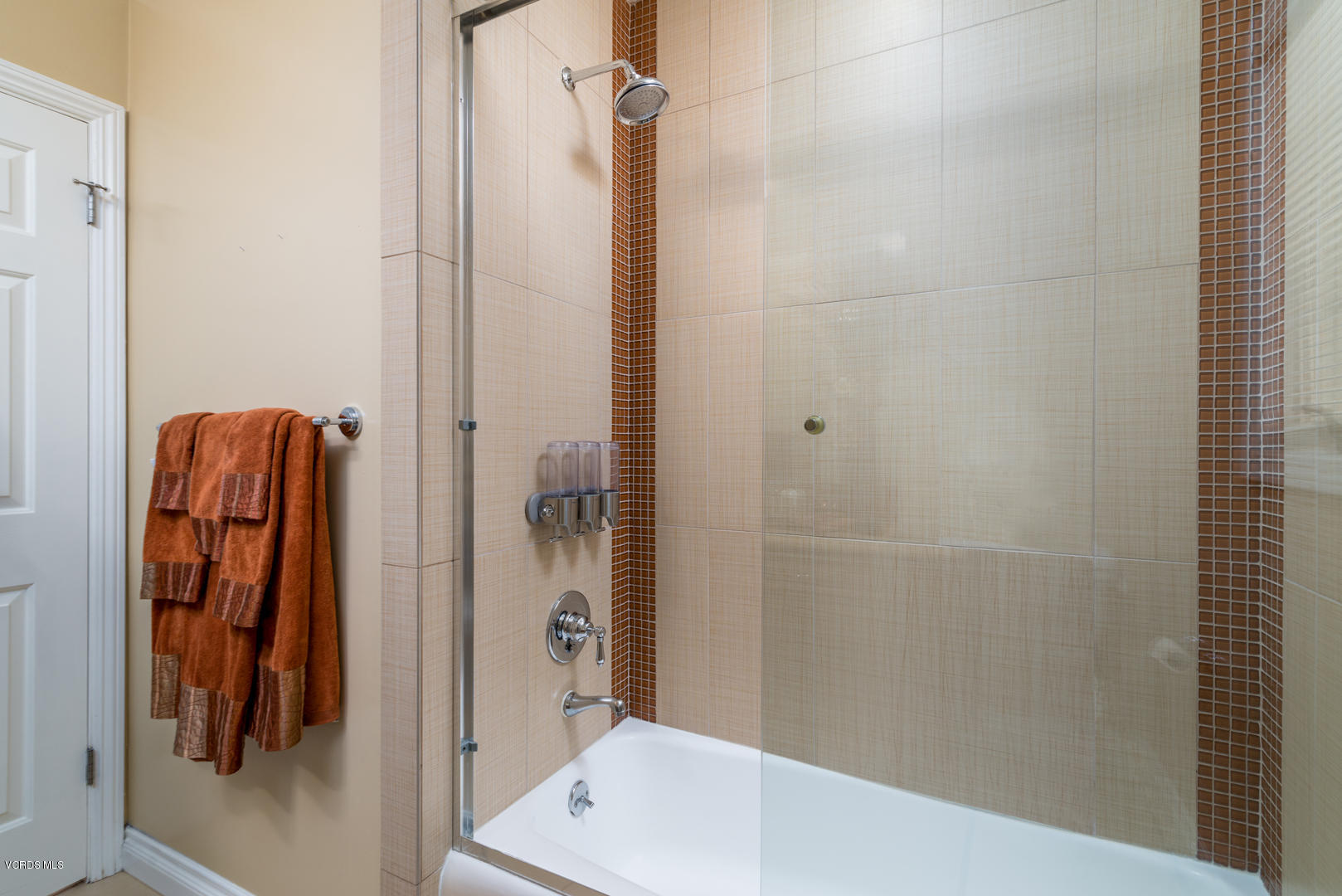 18932 Olympia Street Porter Ranch, CA 91326 - Photo 33 of 39 a bathroom with a shower and a sink